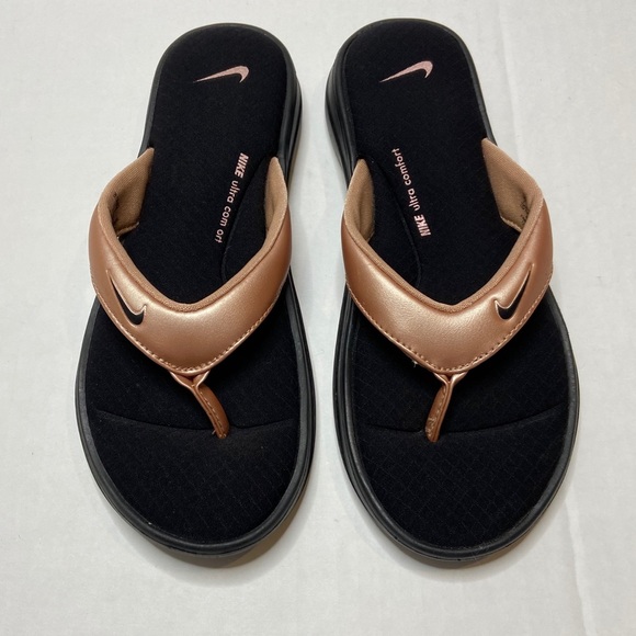 nike rose gold flip flops